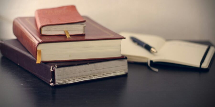 Law books and a notebook, suggesting legal research or study.